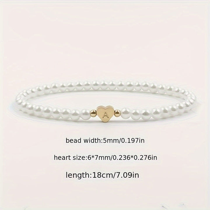 Elegant armbånd med hjerte-initial (A-Å)