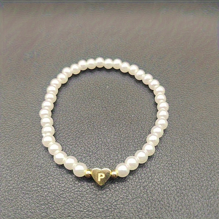 Elegant armbånd med hjerte-initial (A-Å)