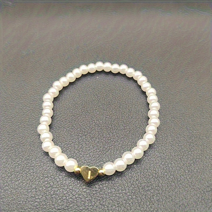 Elegant armbånd med hjerte-initial (A-Å)