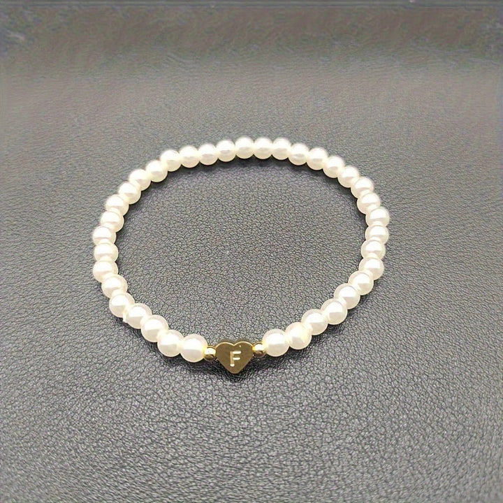 Elegant armbånd med hjerte-initial (A-Å)