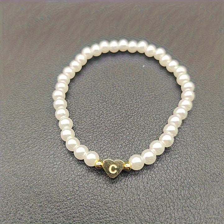 Elegant armbånd med hjerte-initial (A-Å)