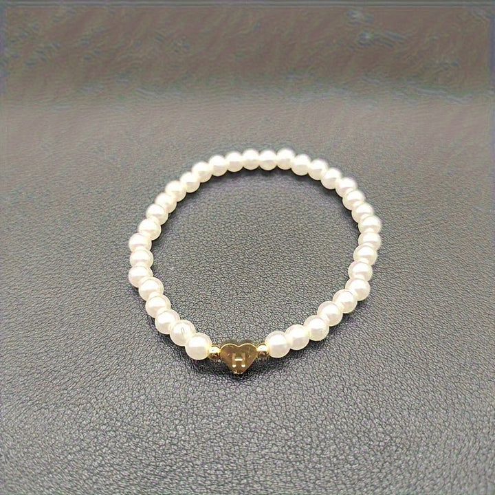 Elegant armbånd med hjerte-initial (A-Å)
