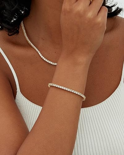 Gullbelagt tennisarmbånd med moissanitt