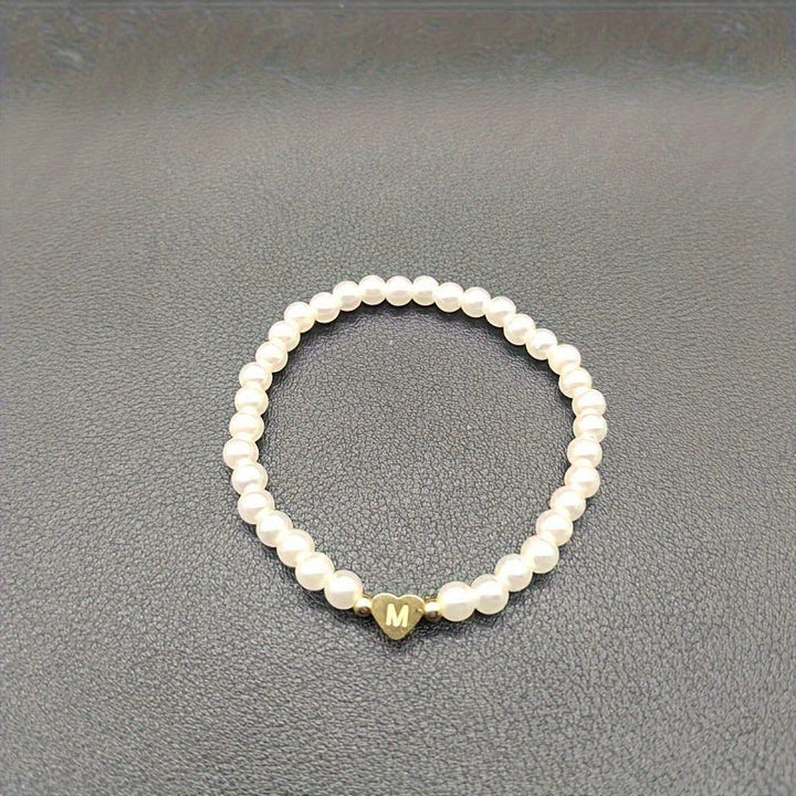 Elegant armbånd med hjerte-initial (A-Å)