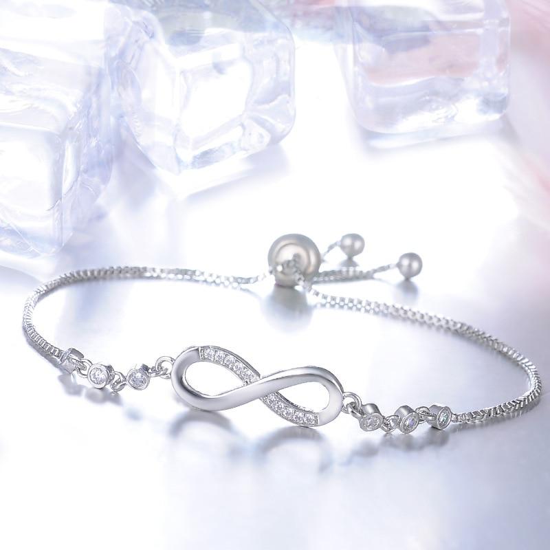 Elegant justerbart infinity-armbånd i rosegull