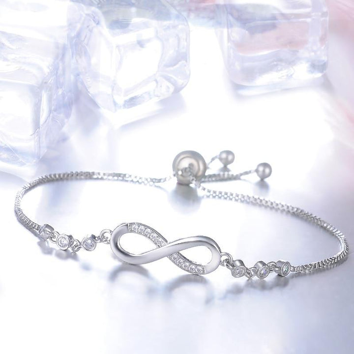 Elegant justerbart infinity-armbånd i rosegull