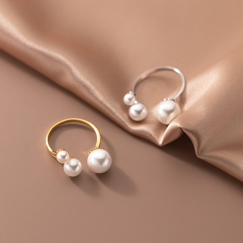 Elegant ring med perletrio