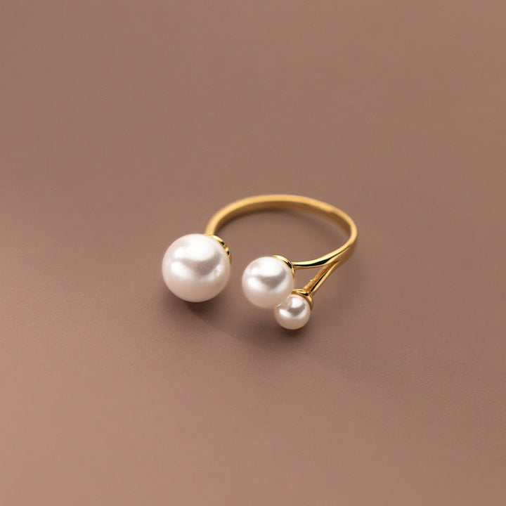 Elegant ring med perletrio