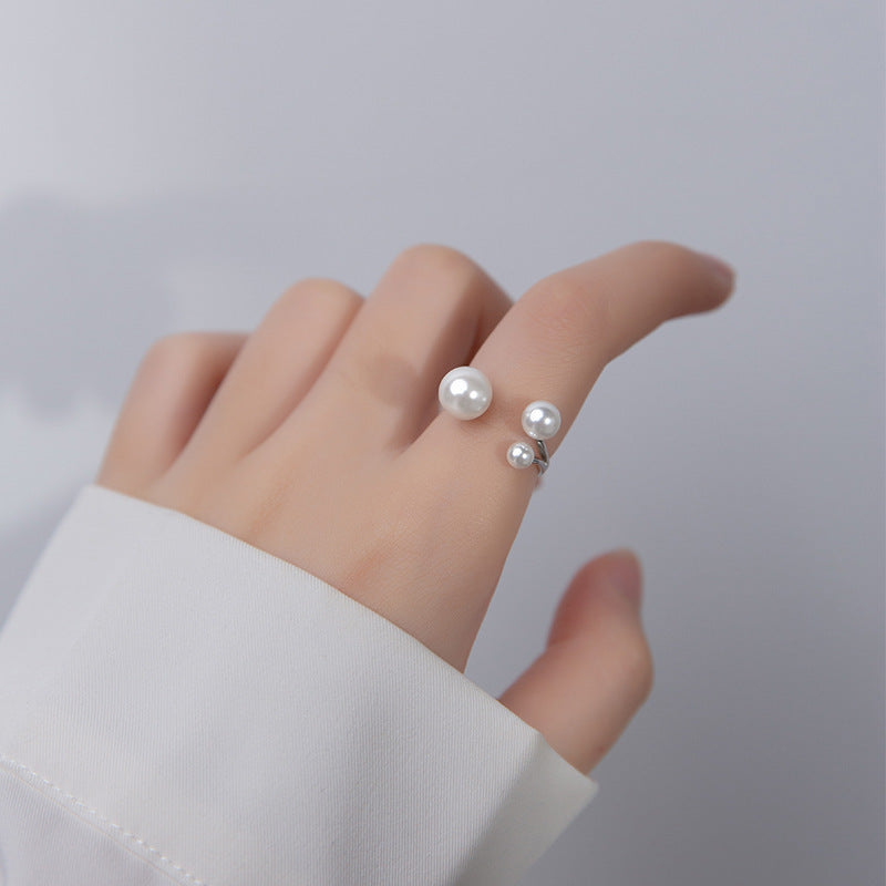Elegant ring med perletrio