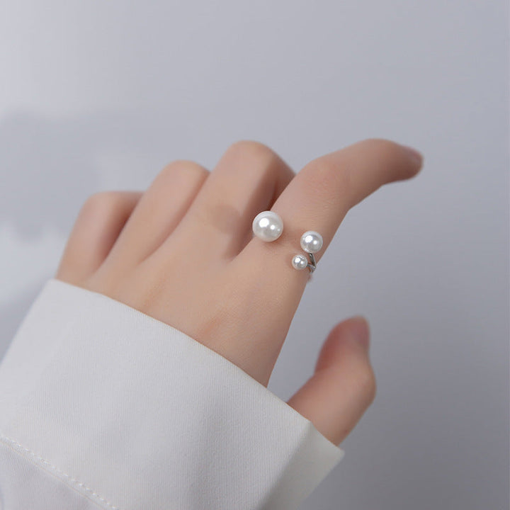Elegant ring med perletrio
