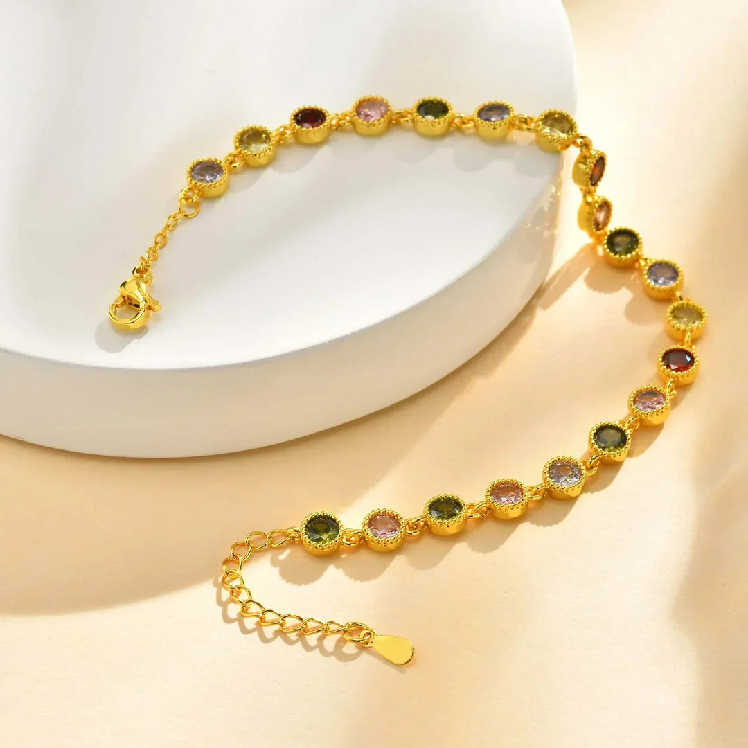 Skinnende regnbue-charm-armbånd