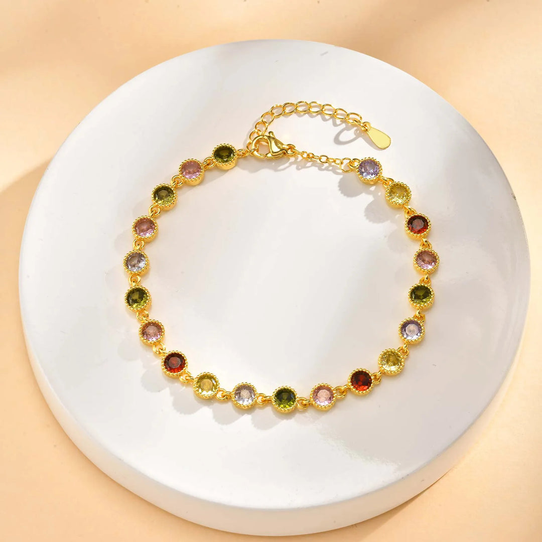 Skinnende regnbue-charm-armbånd