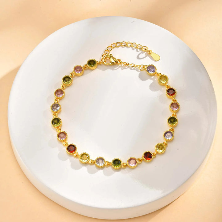 Skinnende regnbue-charm-armbånd