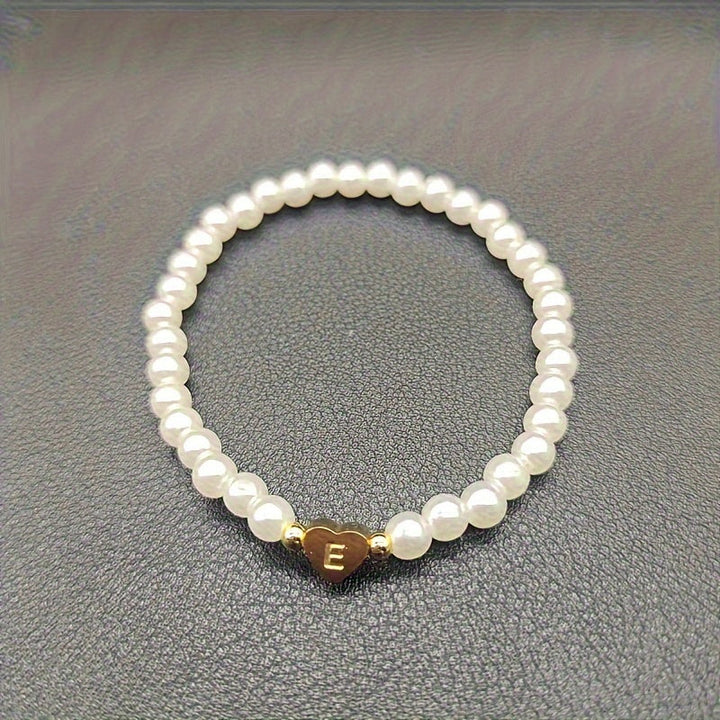 Elegant armbånd med hjerte-initial (A-Å)