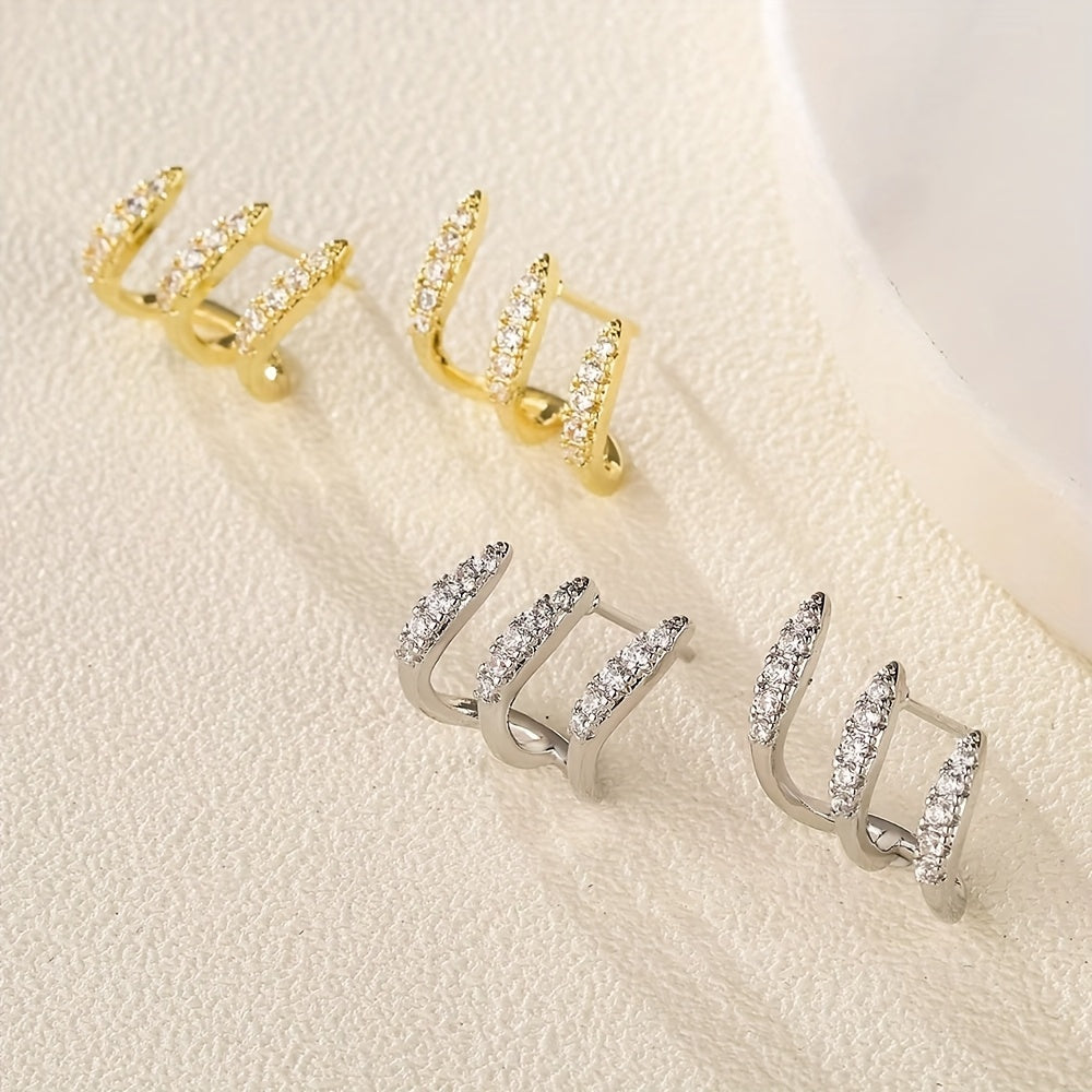 Elegante øredobber med strass i tre klør