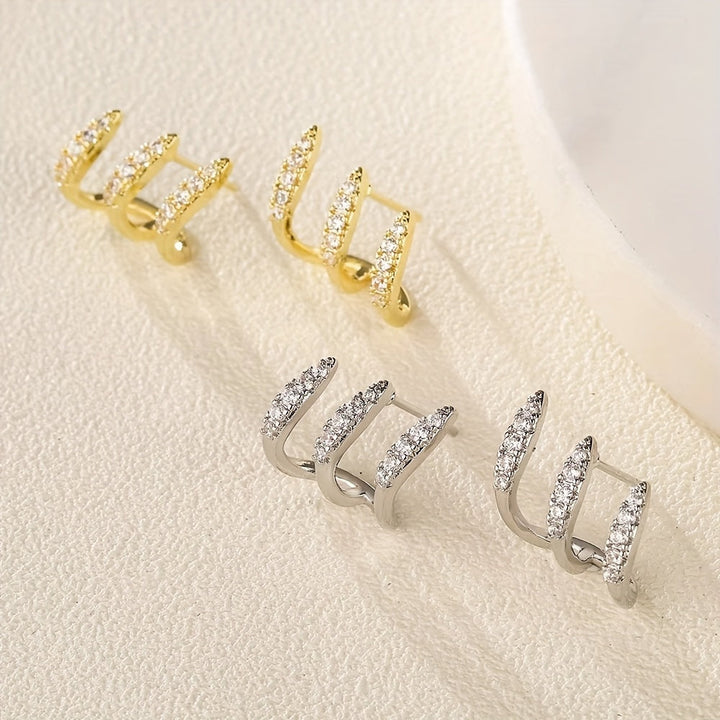 Elegante øredobber med strass i tre klør