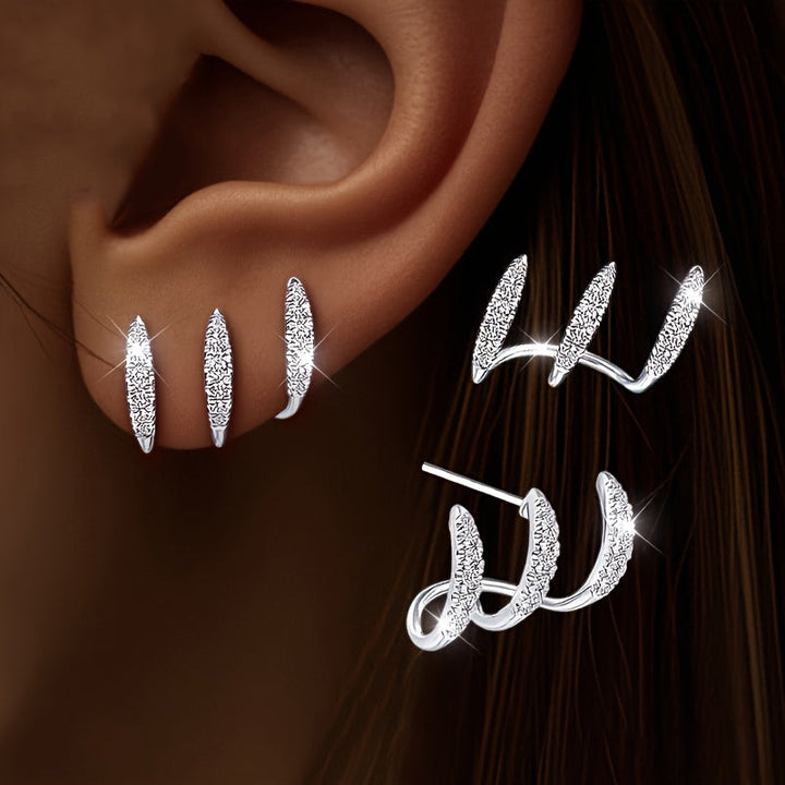 Elegante øredobber med strass i tre klør