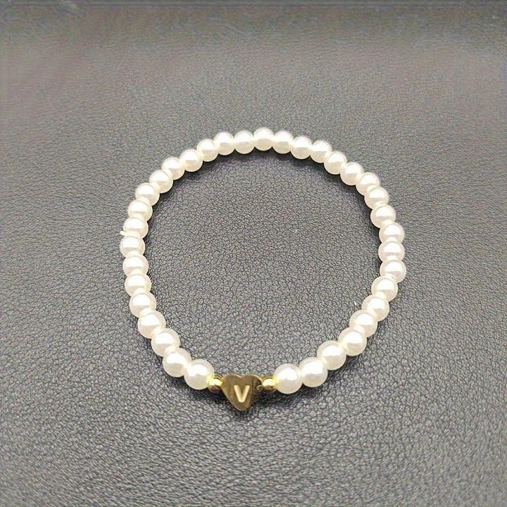 Elegant armbånd med hjerte-initial (A-Å)