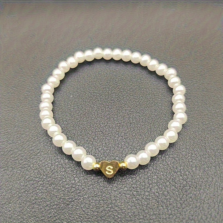 Elegant armbånd med hjerte-initial (A-Å)