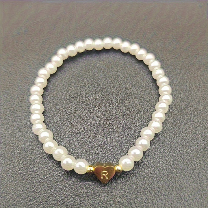 Elegant armbånd med hjerte-initial (A-Å)