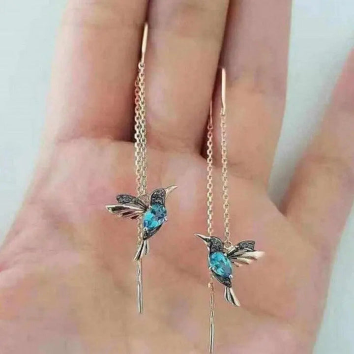 Trådøredobber med kolibri i gull og krystaller